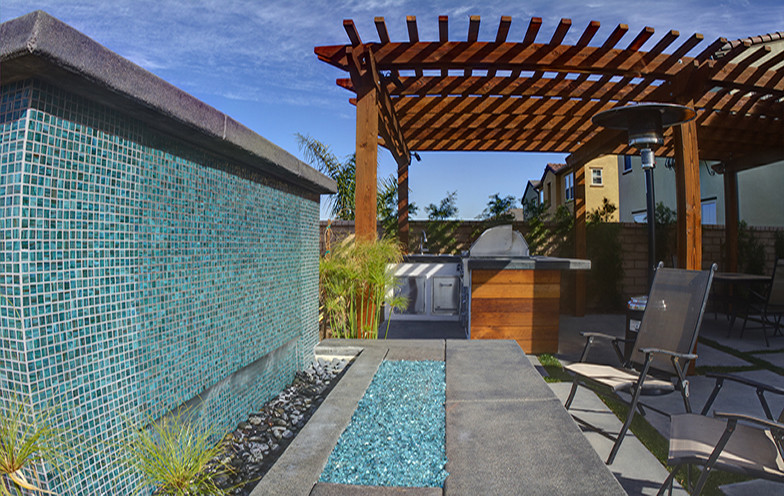 Mosaic tiles work for water walls as good as for pools.