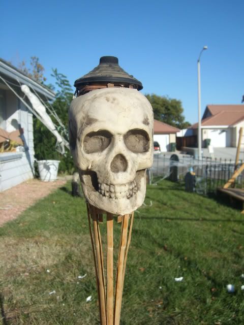 skull tiki torch for outdoor tropical Halloween decor