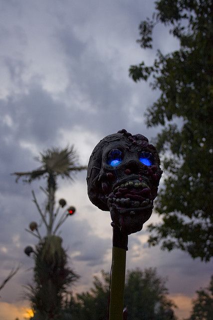 tiki torch shaped as a scary zombie head