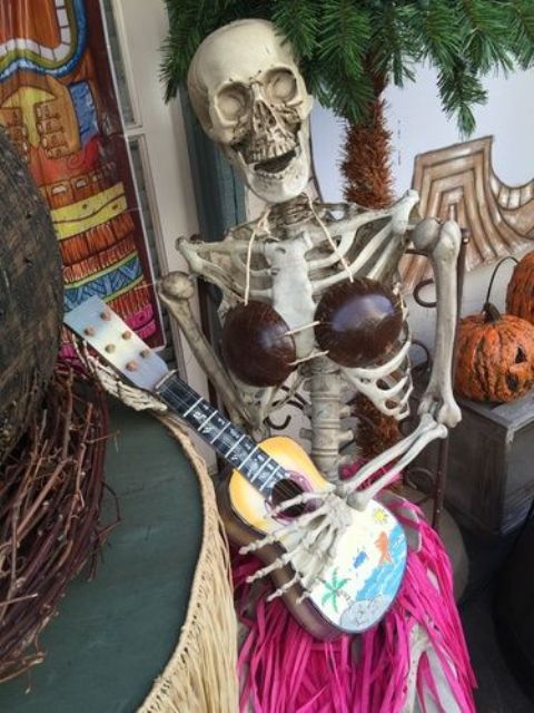 lady skeleton with a guitar is a whimsy Halloween decor idea