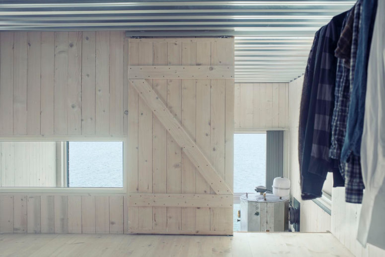wood clad interior The inner decor shows a lot of wood of light warm color, which reminds of country houses