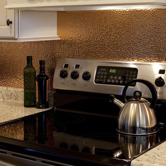 hammered and polished copper metal backsplash