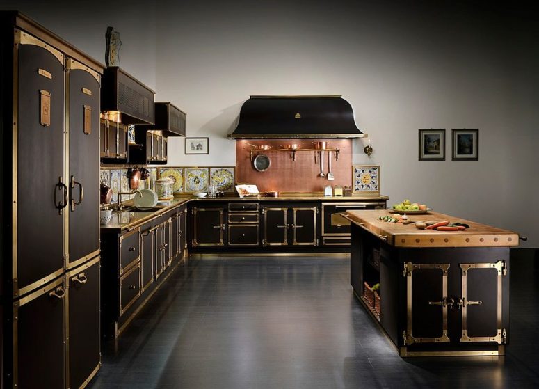 stunning black art deco kitchen with a copper backsplash is bursting with style