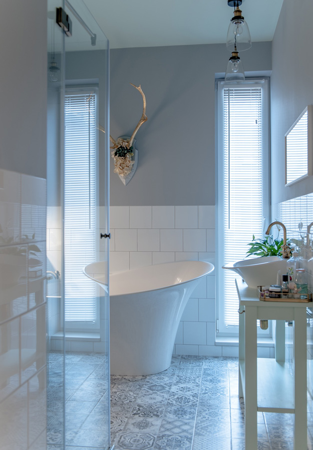 mosaic bathroom tiles Mosaic floors, antles and a unique bathtub are in the bathroom