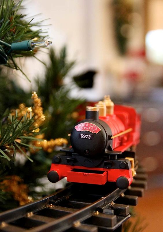Hogwarts Express train placed at the bottom of the tree