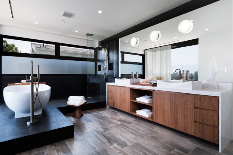 cozy bathroom design with lots of wood The master bathroom is done in warm woods and black tiles, looks very chic and laconic
