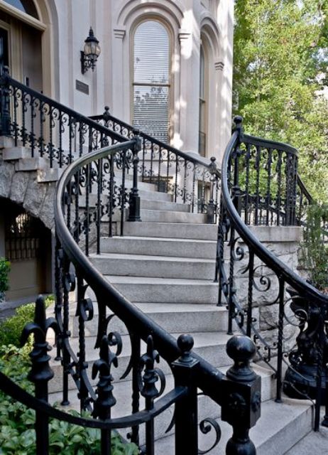 gorgeous black wrought iron railing for a chic entrance look