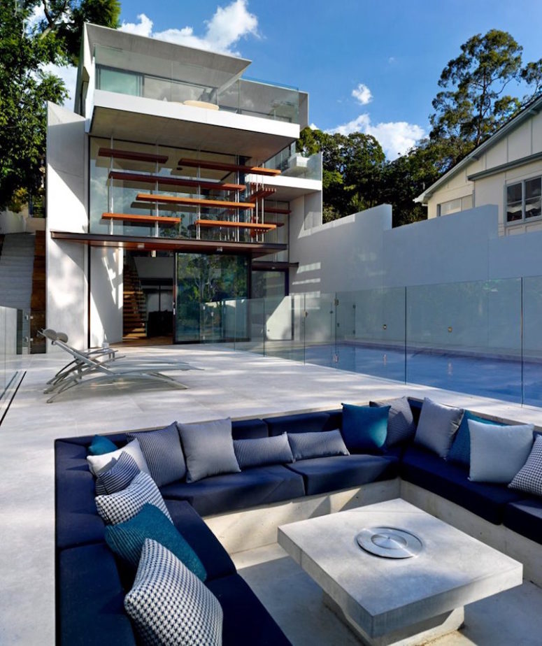concrete conversation pit There's an outdoor sunken conversation pit of concrete decorated in the shades of blue