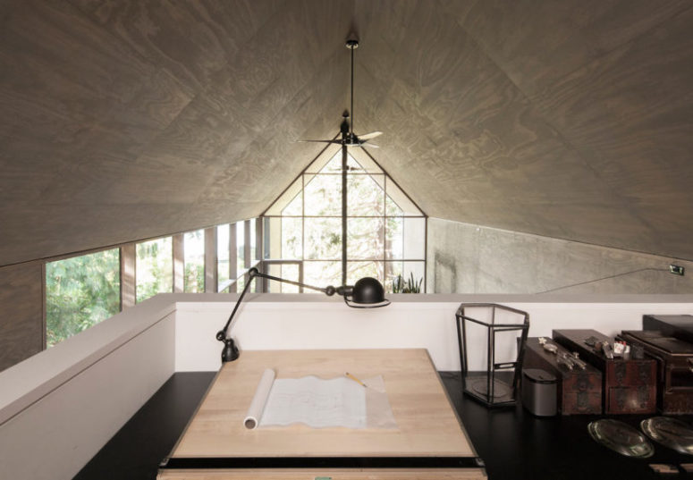 attic home office design The home office is located on the upper level and it's decorated in retro style