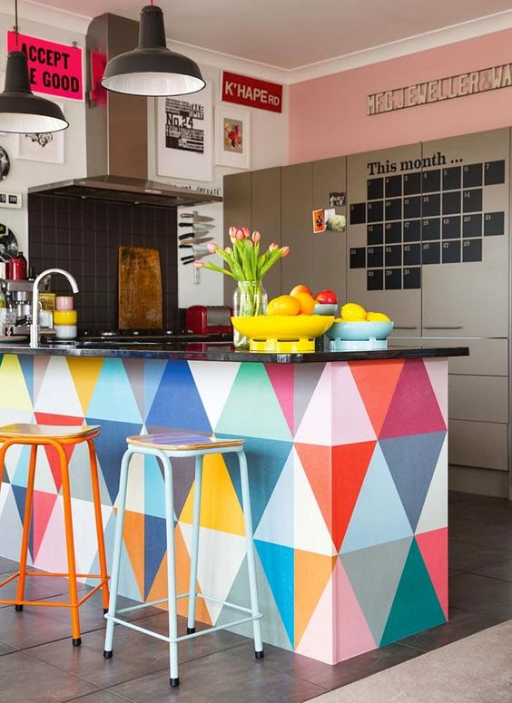 paint your kitchen island with bold triangles to add a bold touch