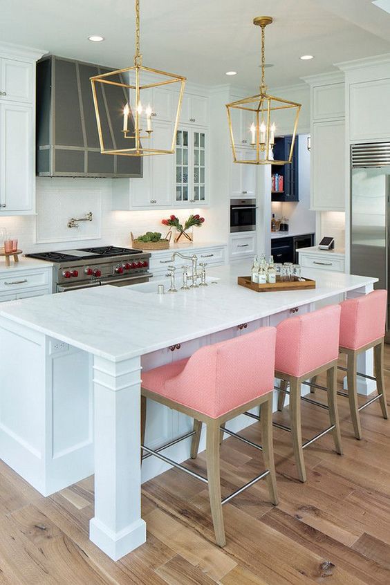 pink upholstered chairs for the breakfast area will spruce up the kitchen