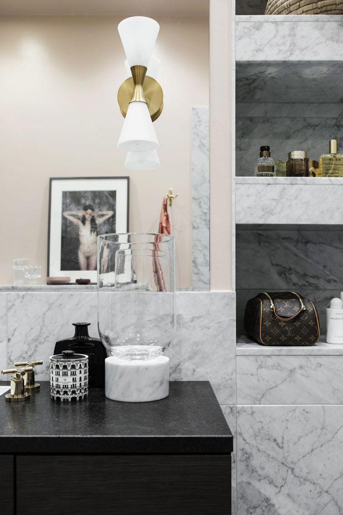 built in shelving for a bathroom The cabinet is black and there are comfy built-in shelves for storage