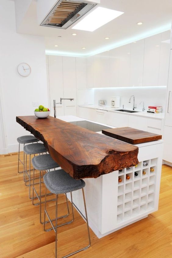 dark stained wooden countertop with a raw edge makes a chic statement