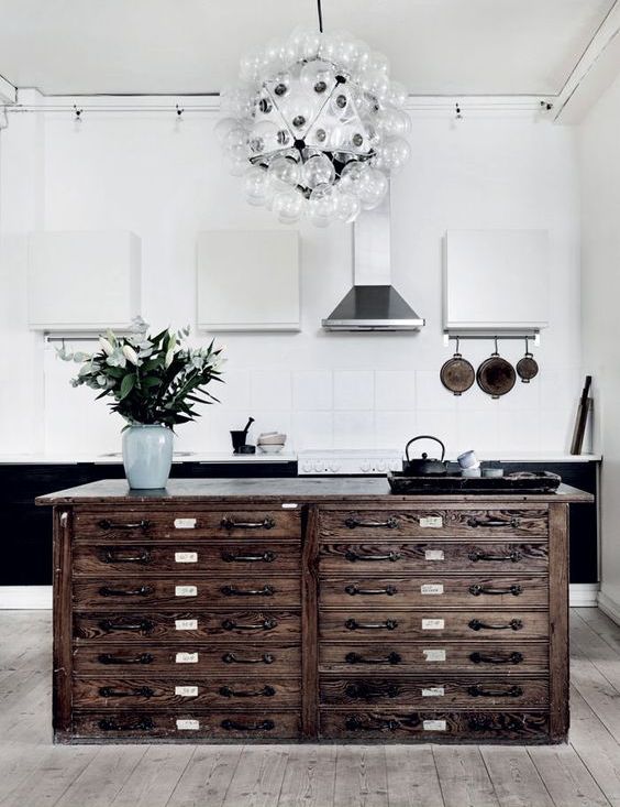 solid dark stained wooden cabinet with drawers and a polish stone top