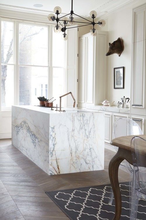 a chic marble kitchen island will make any kitchen exquisite