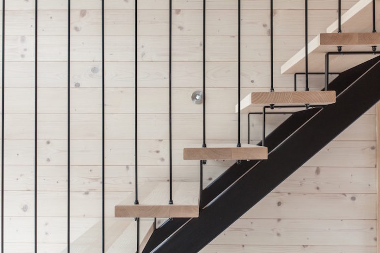 staircase to the attic space A wood and metal staircase connects the ground floor to the attic space