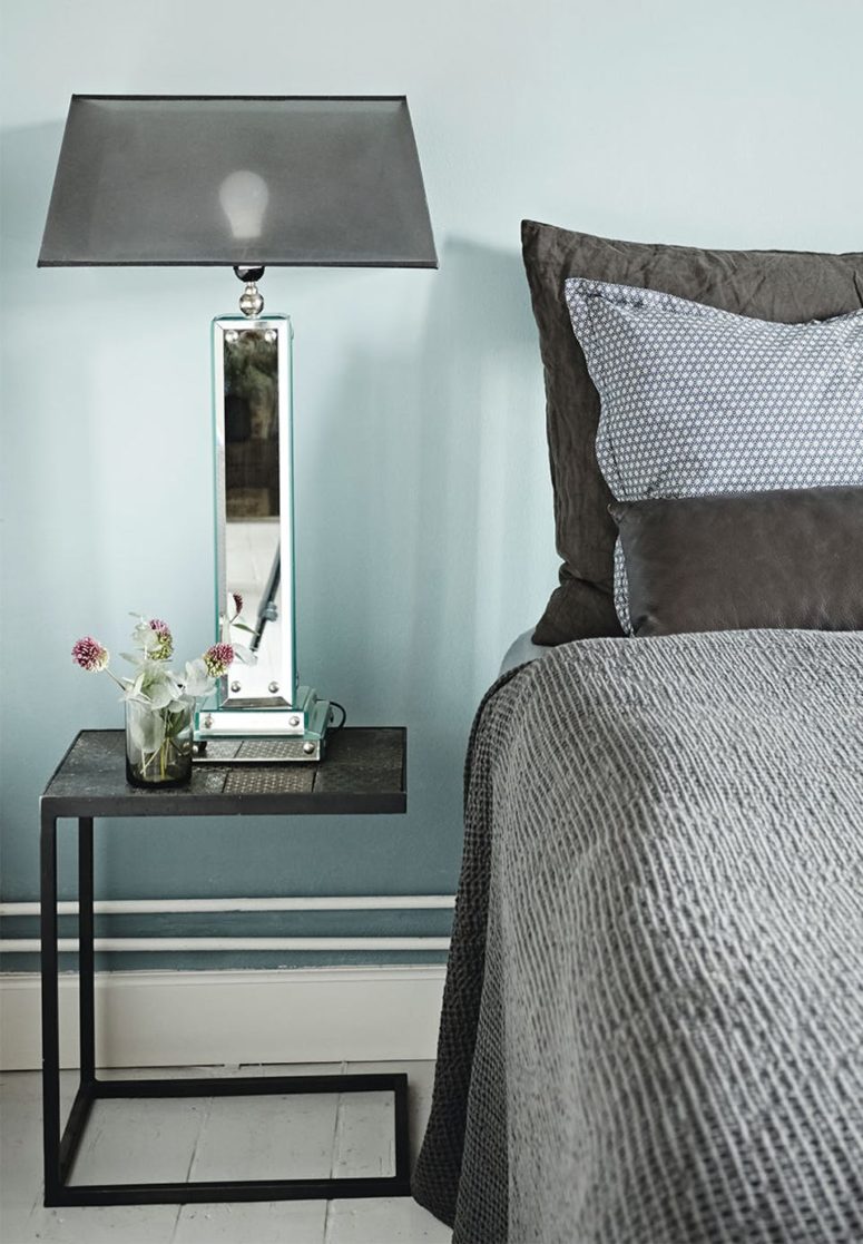 The bedroom is done in dove grey, with grey and black touches, mirror and metal are used to give it a modern and fresh feel The bedroom is done in dove grey, with grey and black touches, mirror and metal are used to give it a modern and fresh feel