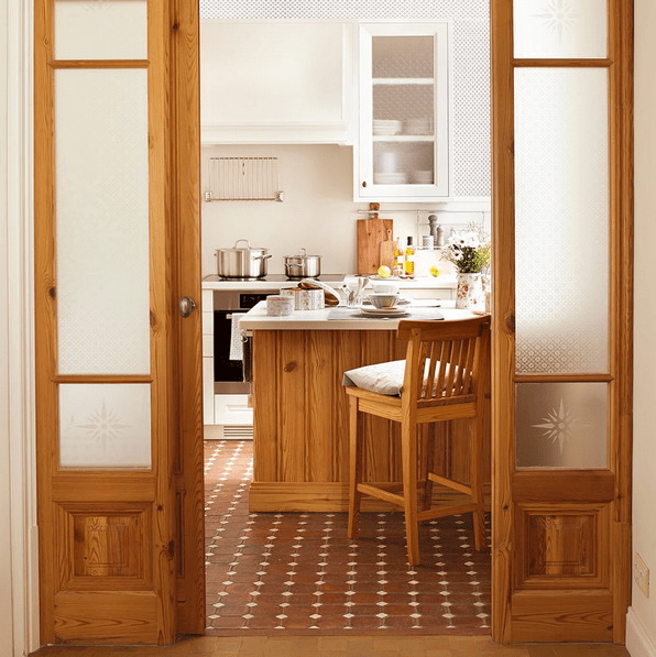 This small kitchen was done in an L shape and made functional