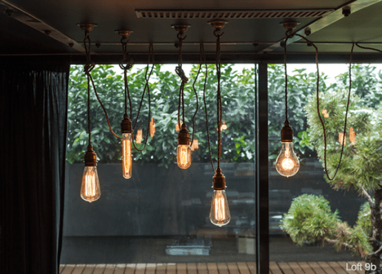 Industrial Loft With Brick Walls And Lots Of Metal In Decor