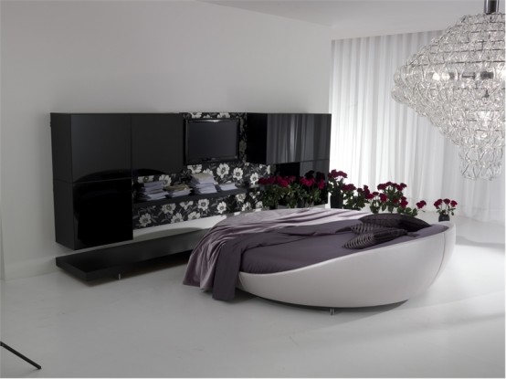 http://www.digsdigs.com/photos/Contemporary-leather-Round-bed-by-Prealpi-11-554x415.jpg