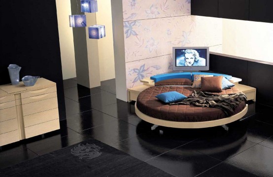 http://www.digsdigs.com/photos/Contemporary-leather-Round-bed-by-Prealpi-15-554x359.jpg