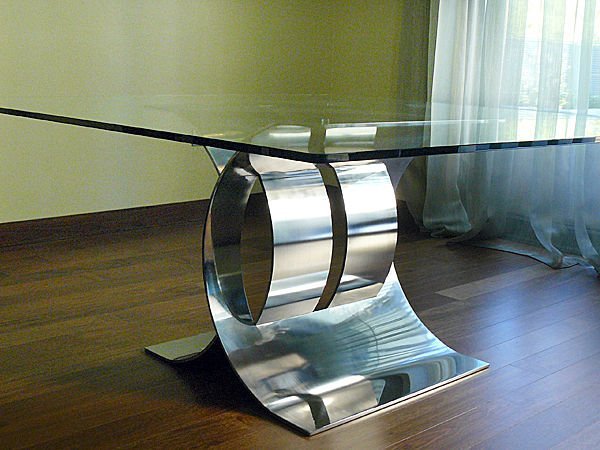 http://www.digsdigs.com/photos/Glass-top-dining-table-with-original-base-32.jpg