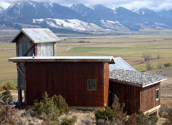 Home With Weathered Wood And Metal Exterior