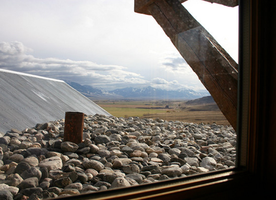 Home With Weathered Wood And Metal Exterior