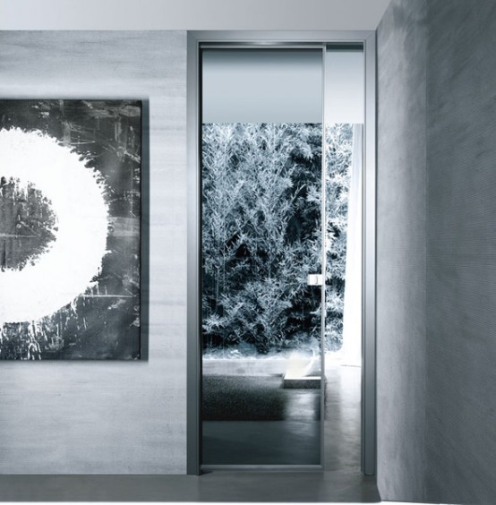 http://www.digsdigs.com/photos/Modern-interior-glass-doors-Spin-by-Rimadesio-7-554x564.jpg