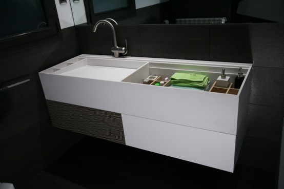 http://www.digsdigs.com/photos/Practical-bathroom-furniture-with-integrated-baby-tub-by-Herms-6-554x369.jpg