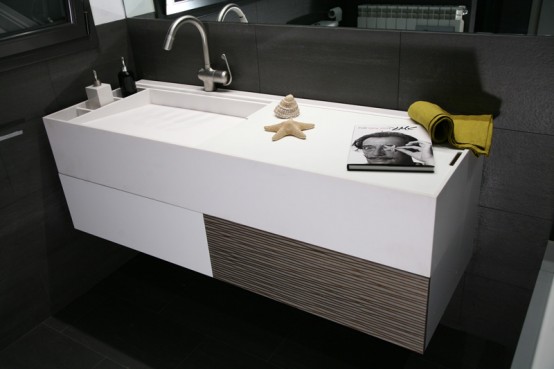 http://www.digsdigs.com/photos/Practical-bathroom-furniture-with-integrated-baby-tub-by-Herms-7-554x369.jpg