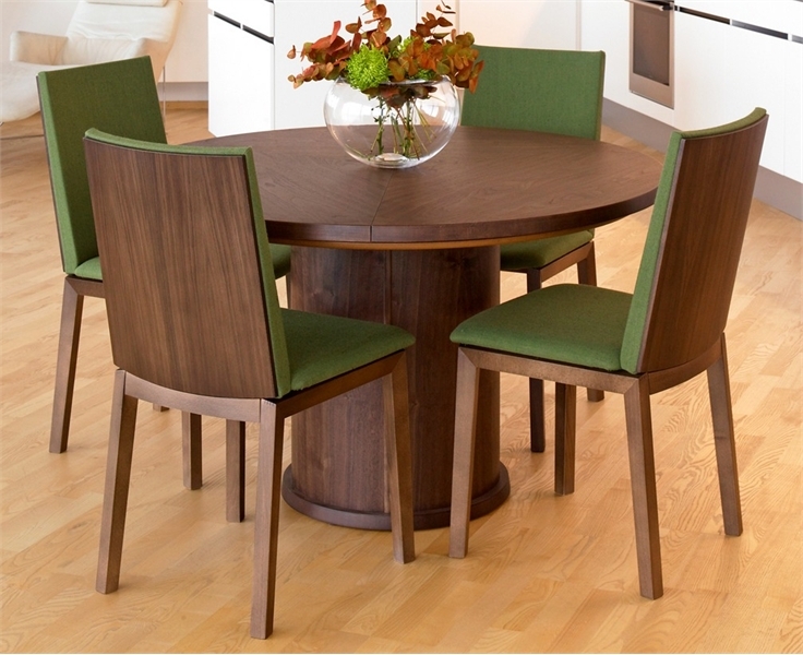 Trendy Expandable Round Dining Table by Skovby - DigsDigs