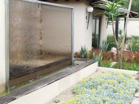Such water feature is a great addition to a raised garden bed.