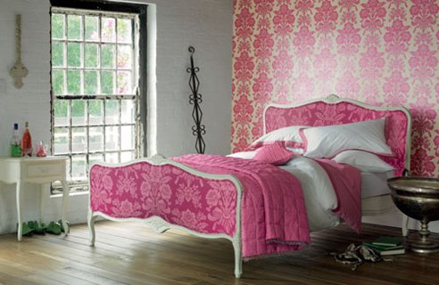 Bedroom With Bold Wallpaper And Bed