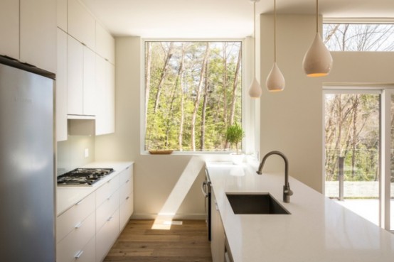 Cantilivered Lake Cottage With Airy White Oak Interiors Cantilivered Lake Cottage With Airy White Oak Interiors