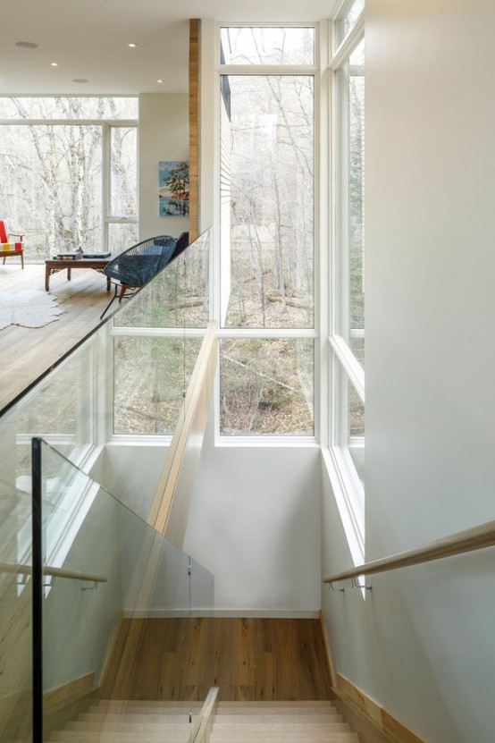 Cantilivered Lake Cottage With Airy White Oak Interiors Cantilivered Lake Cottage With Airy White Oak Interiors