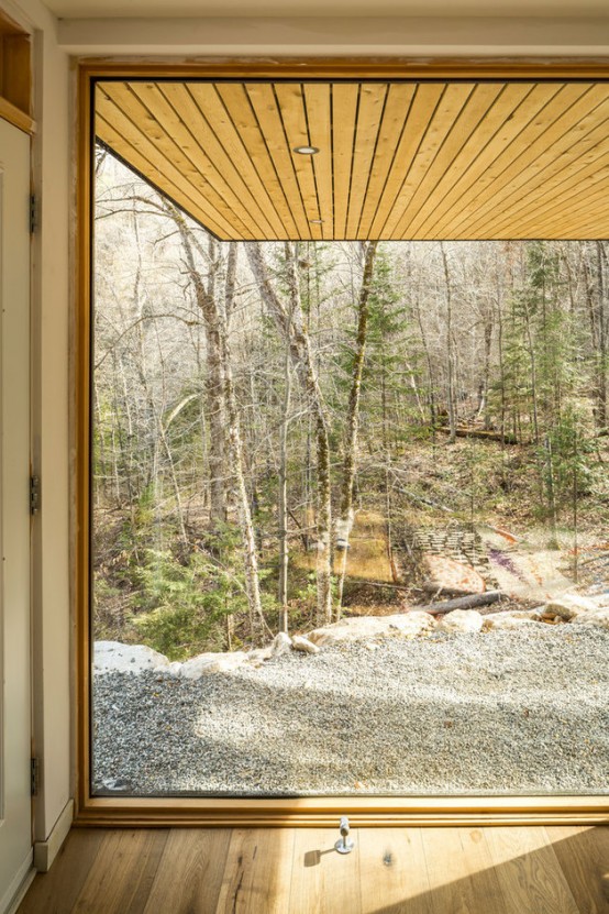 Cantilivered Lake Cottage With Airy White Oak Interiors Cantilivered Lake Cottage With Airy White Oak Interiors