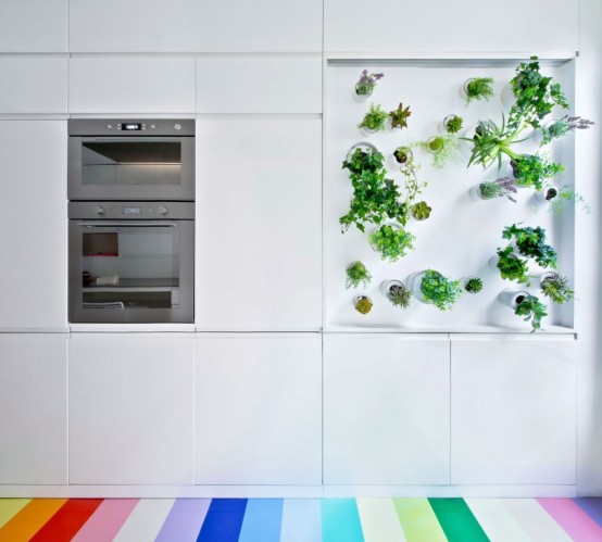 Colorful Apartment With A Multi Functional Wall Unit