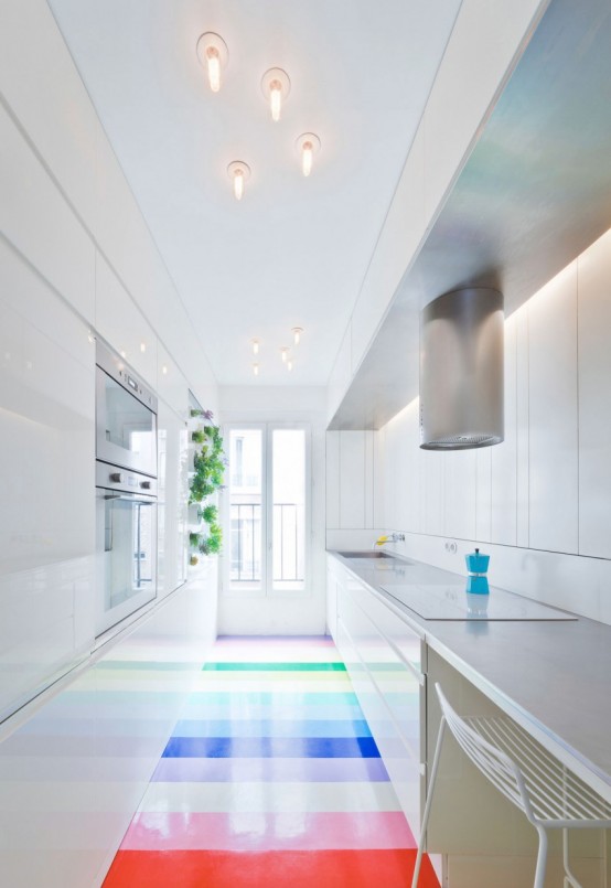 Colorful Apartment With A Multi Functional Wall Unit