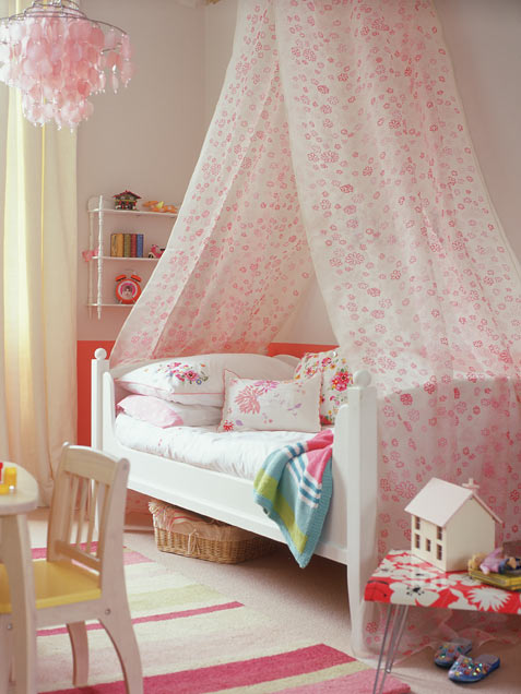 Cozy Girl Bedroom With High Canopy Draped Over A Bed