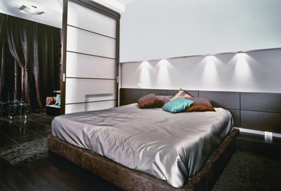 interior designs How to care for oiled parquet Luxury-modern-bedroom-design-with-wooden-floor-wardrobe-double-bed-bedding-bedside-tables-and-pillows