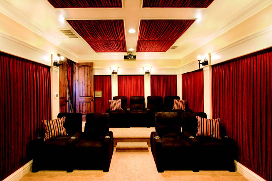 Dramatic Home Theater Design With Curtains on Every Wall | DigsDigs