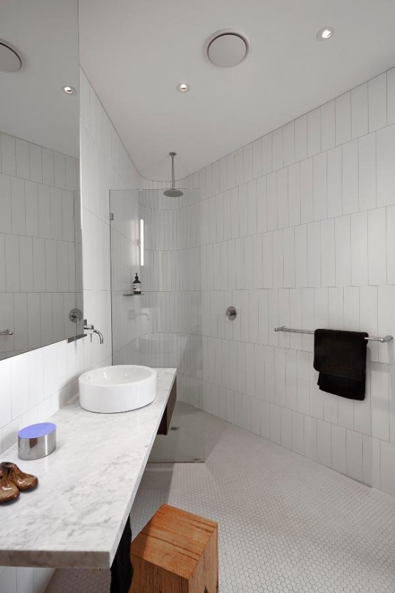 Minimalist White Loft Design With Sculptural Accents