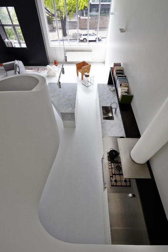 Minimalist White Loft Design With Sculptural Accents