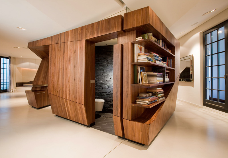 Modern Loft With A Freestanding Centralized Wood Veneer