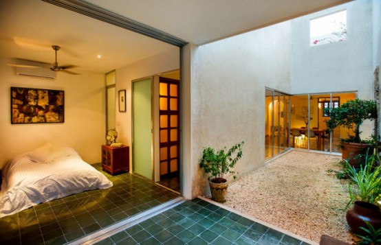 Modern Tree House With Natural Touches And Local Art Pieces