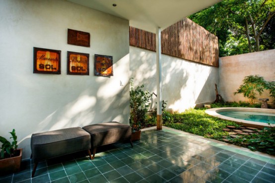 Modern Tree House With Natural Touches And Local Art Pieces