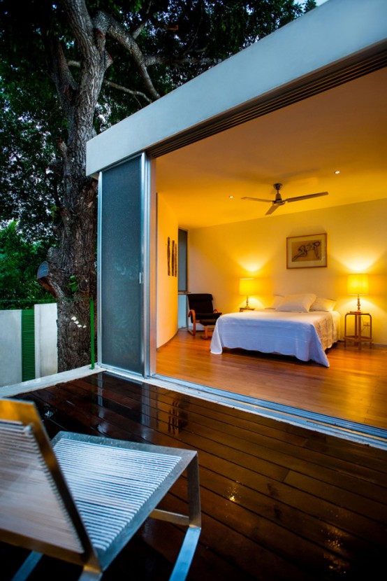 Modern Tree House With Natural Touches And Local Art Pieces