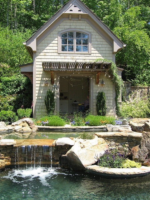 Cozy little summer kitchen house with a gorgeous pond near by.