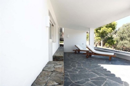 Rustic House With Massive Rock Formations In The Interior Rustic House With Massive Rock Formations In The Interior